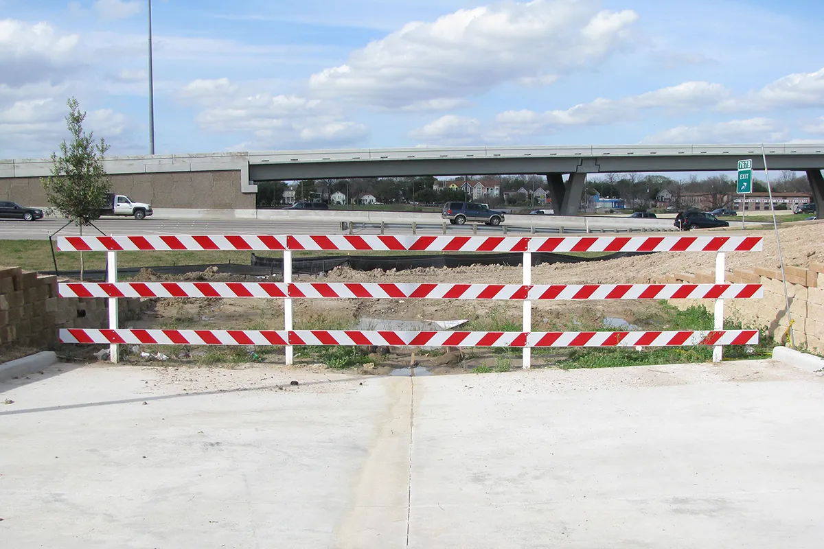 Traffic control work zone setup in Houston with barricades and signage